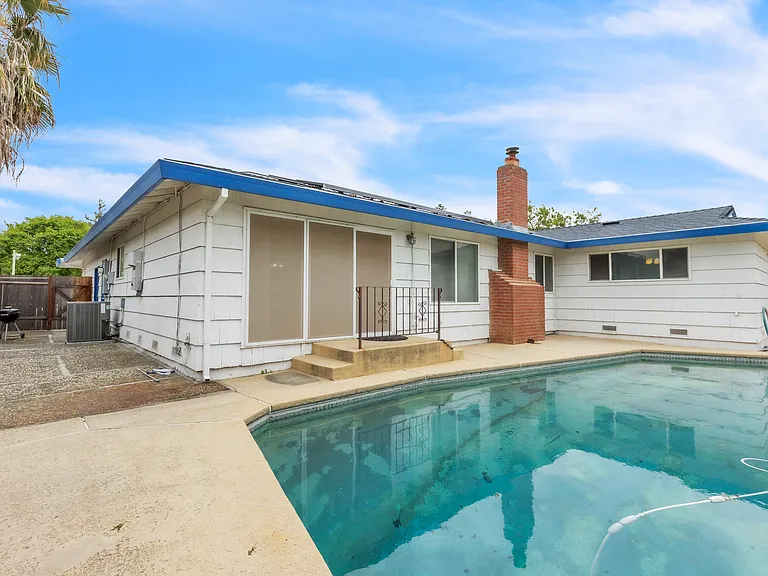 The backyard and pool.