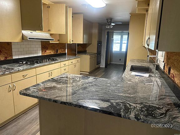 3rd image of 1701 W 3rd Ct
