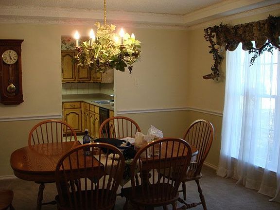 Formal dining has room for side boards and chests