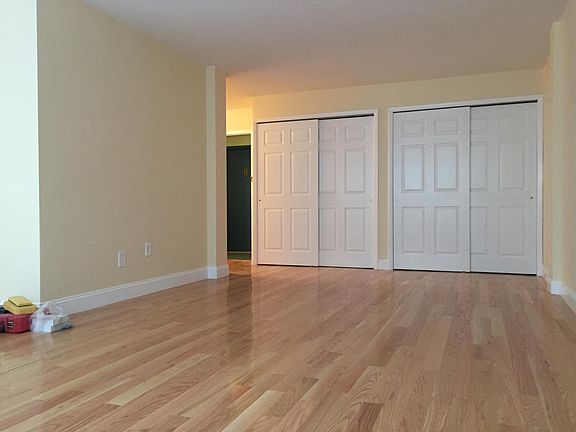 living room with lots of closets