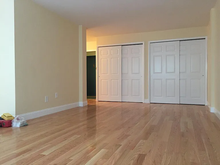 living room with lots of closets
