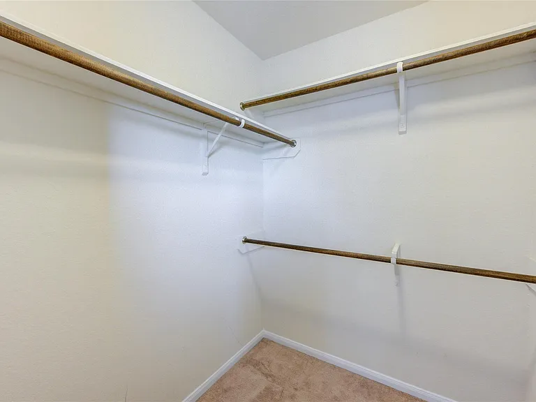 10907 Woodland Leaf Ln — Photo 29