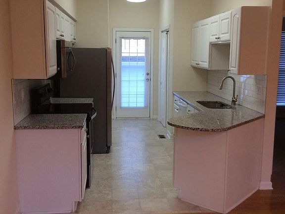 Kitchen with stainless steel appliances and granite counter tops