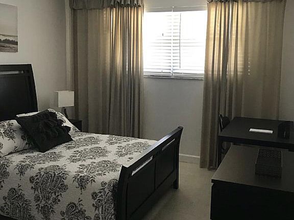 Bedroom #2 Queen Bed with walk in closet 