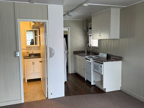 Living Room, Bathroom, Kitchen.