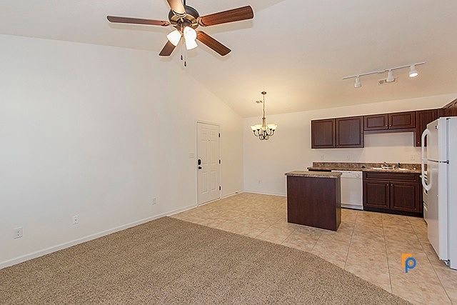 Second floor units only offer vaulted ceilings, ceiling fan