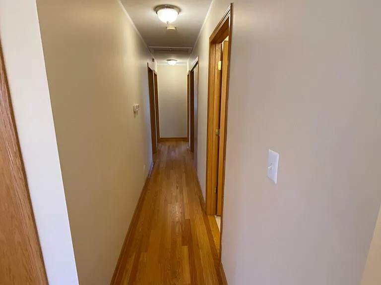 Hallway leading to upstairs bedrooms