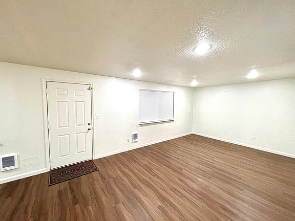 Large open space living room with Luxury Vinyl flooring