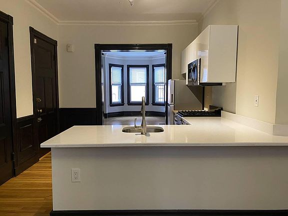 New IKEA kitchen with quartz counters. Lots of storage.