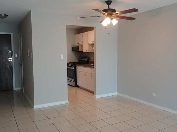 Facing doorway and kitchen