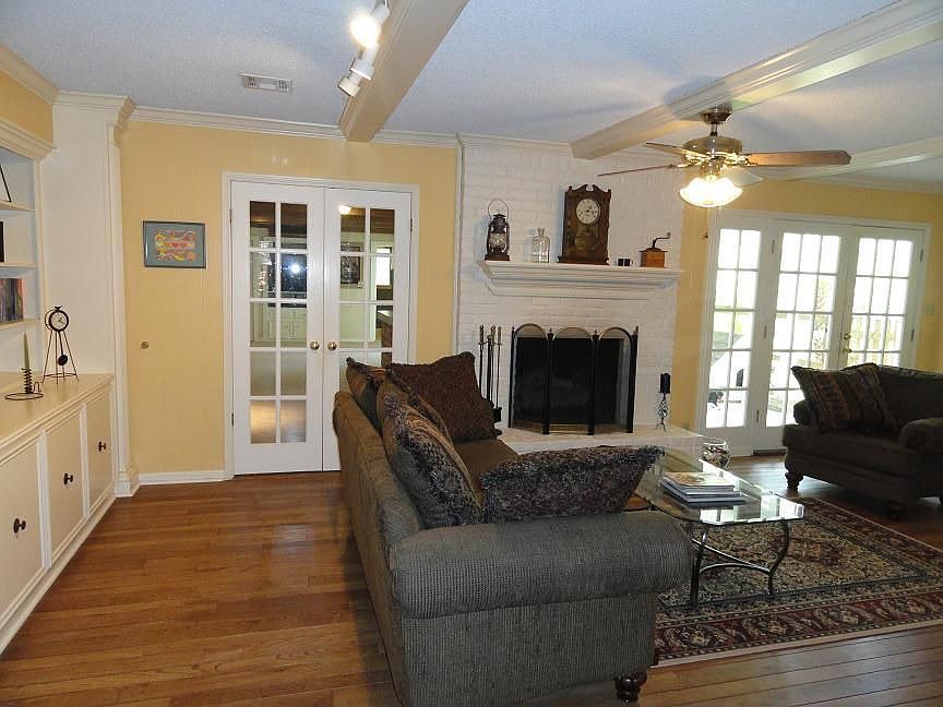 Den with Gorgeous Hardwood Flooring