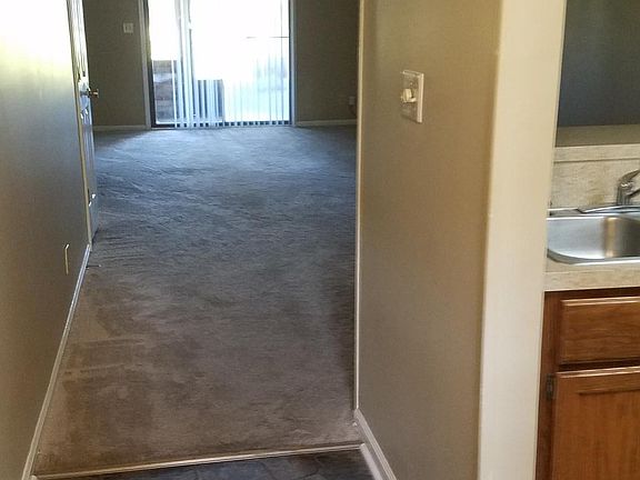 Entry hallway, half bath to your left