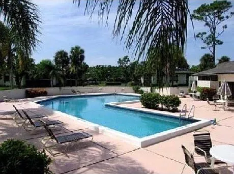 Large heated pool next to condo