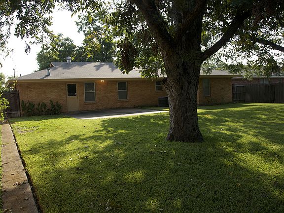 back looking at house