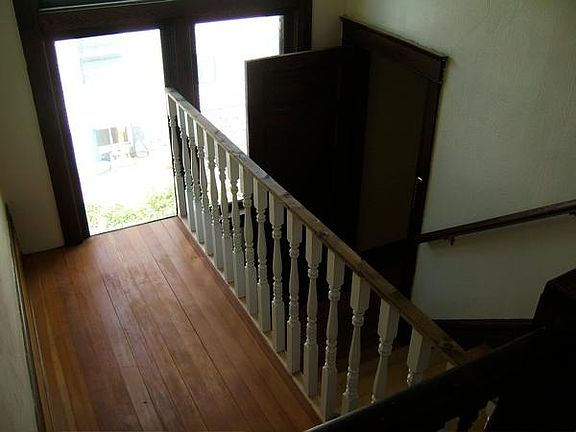 extra little space ( there is no gate now. ) it is the 2nd floor entrance