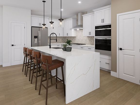 Gourmet Kitchen Opens to the Cafe and Gathering Room