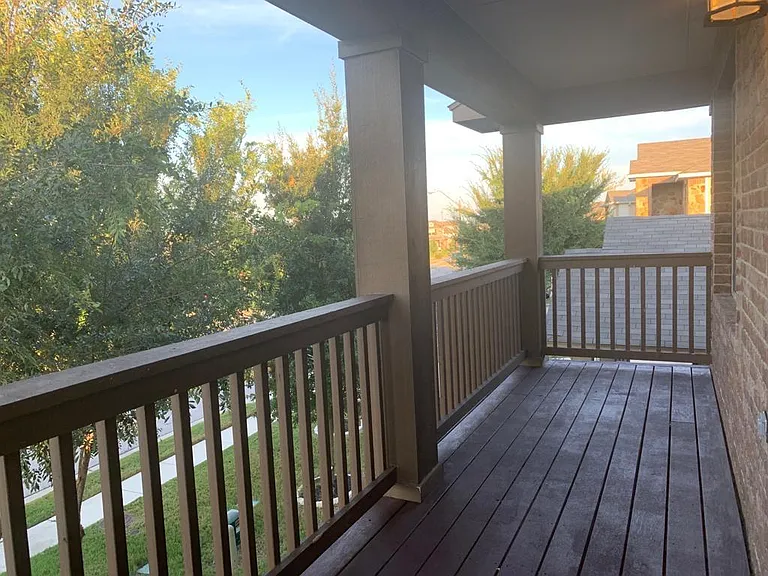 Nice balcony space to relax with shading trees