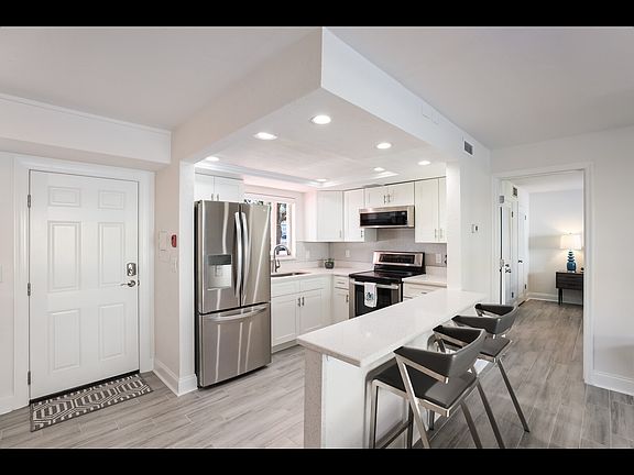 All new stainless steel appliances and new cabinetry.