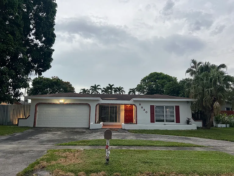 8830 NW 8th St — Photo 1