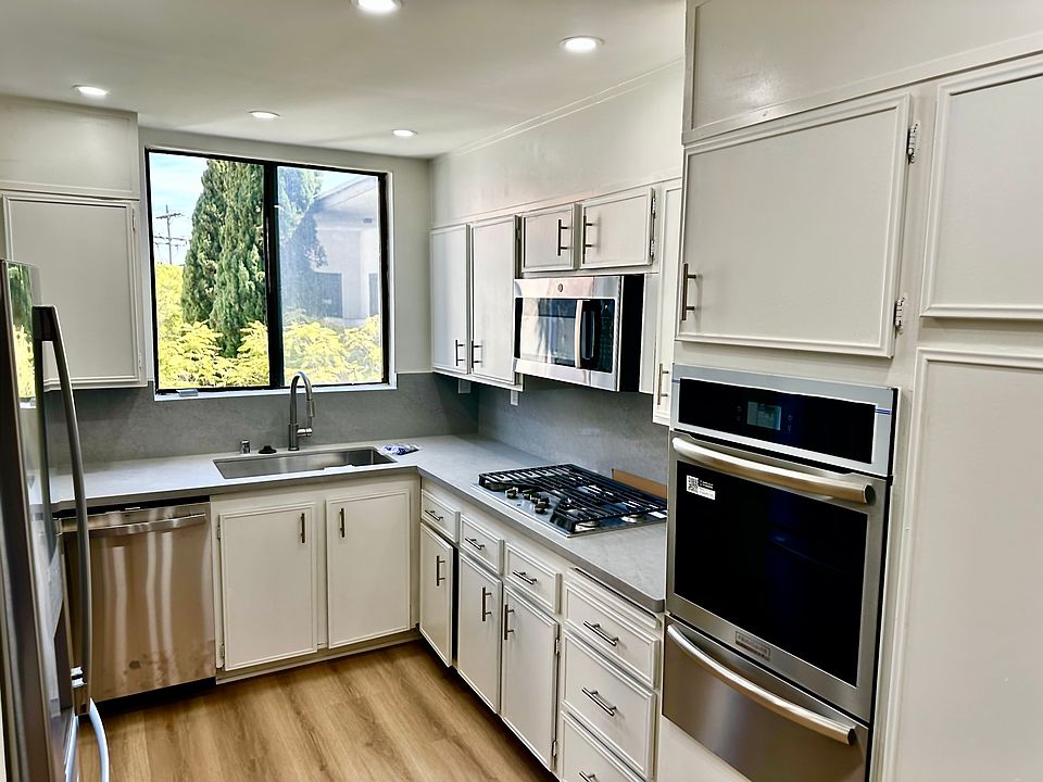 1 bedroom kitchen with all BRAND NEW stainless steel appliances including wine refrigerator and built-in air fryer with the oven! Also brand new quartzite countertops and backsplash!