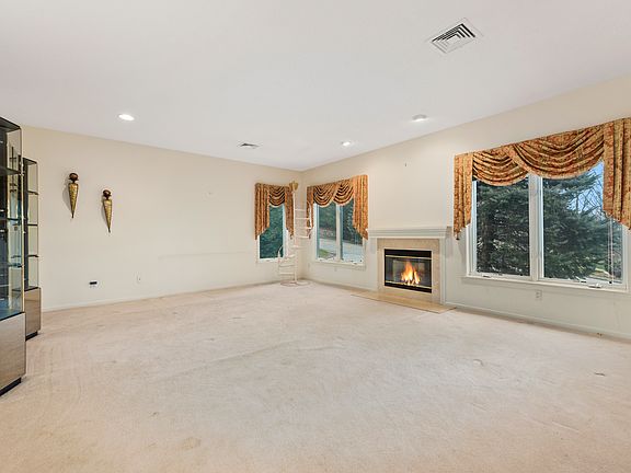 Spacious formal living room with fireplace