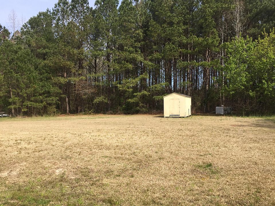 Back yard with storage building