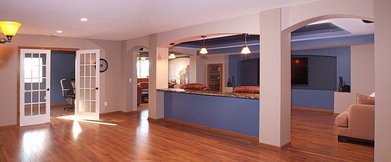 Lower Level : Bottom of stairs toward office/bedroom, sitting room and media room