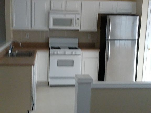 View family room into kitchen