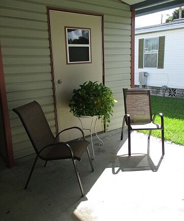 8x10 Storage off carport
