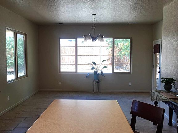 Kitchen/ Dinning with door to backyard