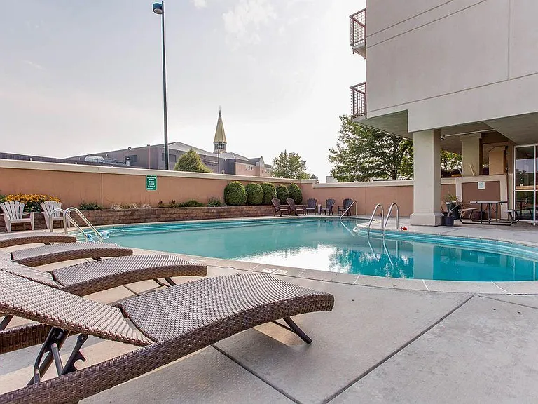 Outdoor seasonal pool in fenced 
pet-free courtyard with gas bbq grill.