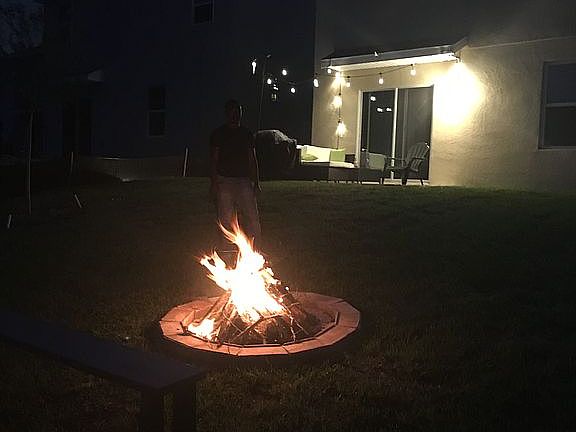 Fire pit in spacious yard 