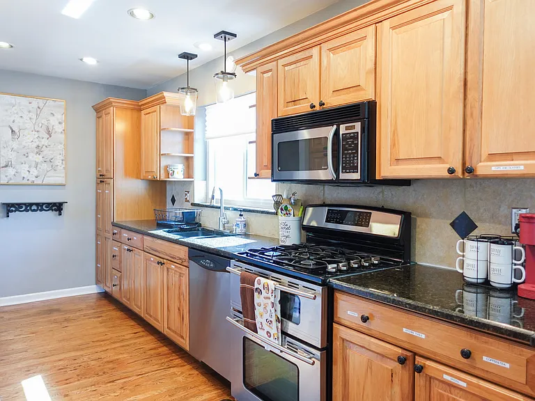 1st Kitchen: Fully Stocked with Everything Needed for a Comfortable Stay
