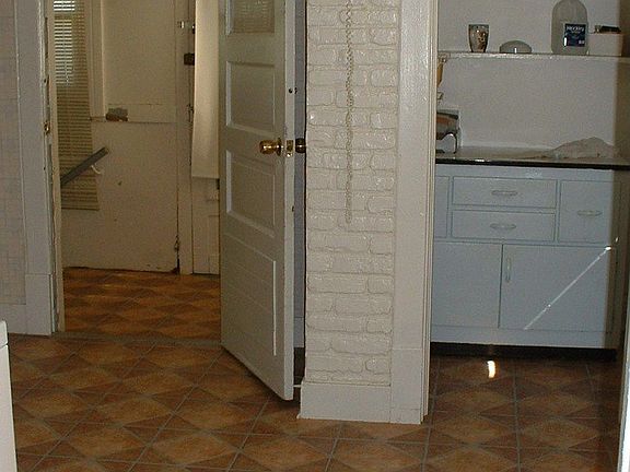 Kitchen & enclosed Back Porch