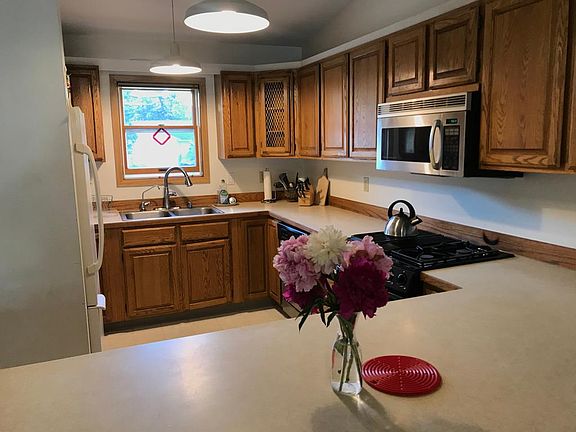 The kitchen and peninsula. We have dinner parties where our guests help prep from. the back of the peninsula giving us space to cook in the kitchen. We pull many greens and herbs from the garden. Plus the floor in the kitchen is heated;)