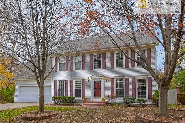 Welcome home to this classic colonial in the heart of Lenexa!