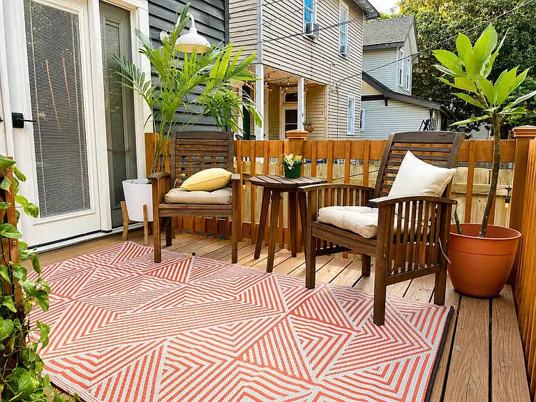 Enjoy the outdoors with your private back deck and backyard!