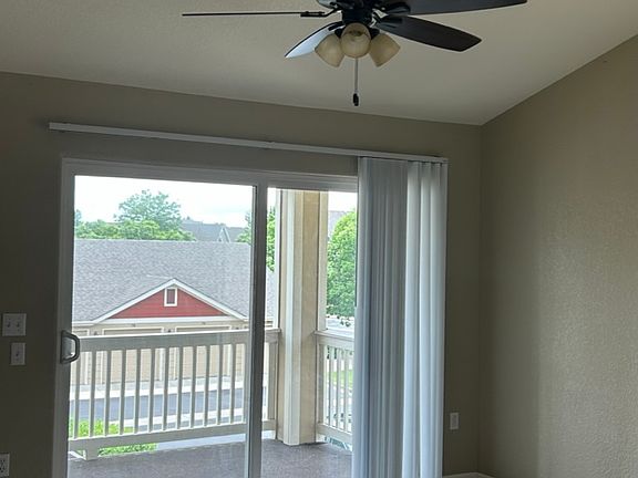 Sliding glass door that leads to over-sized deck