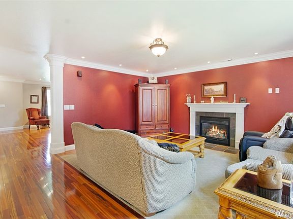 Another view of the family room with white crown molding.