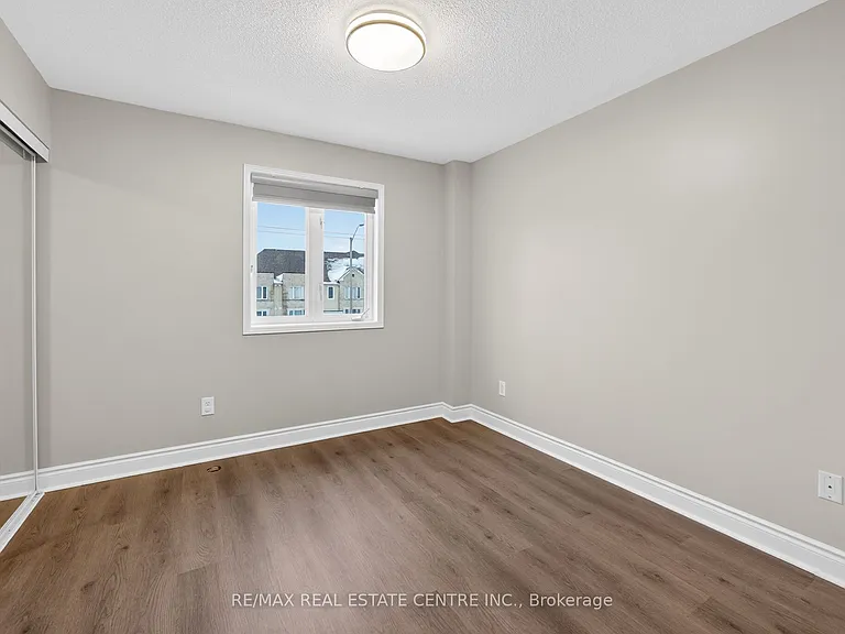 5035 Oscar Peterson Blvd #105 — Photo 23