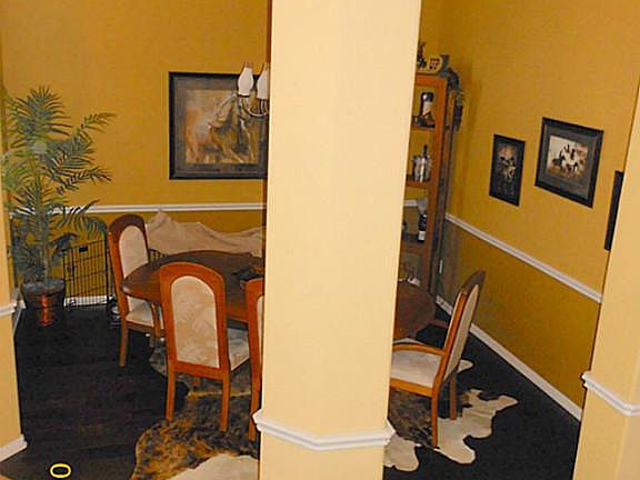 Dining Room with hardwood flooring, ceramic tile entry