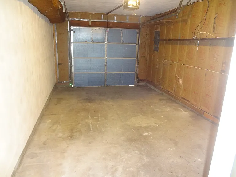 Garage has automatic opener and entry into the kitchen