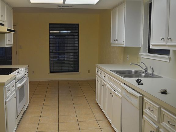 kitchen with eat in area and large pantry plus separate laun