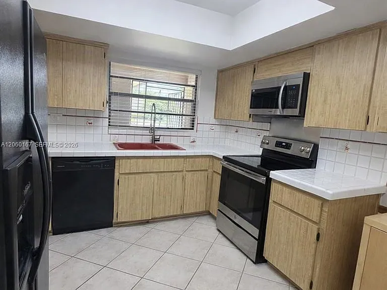 9119 SW 129th Ln — Photo 13