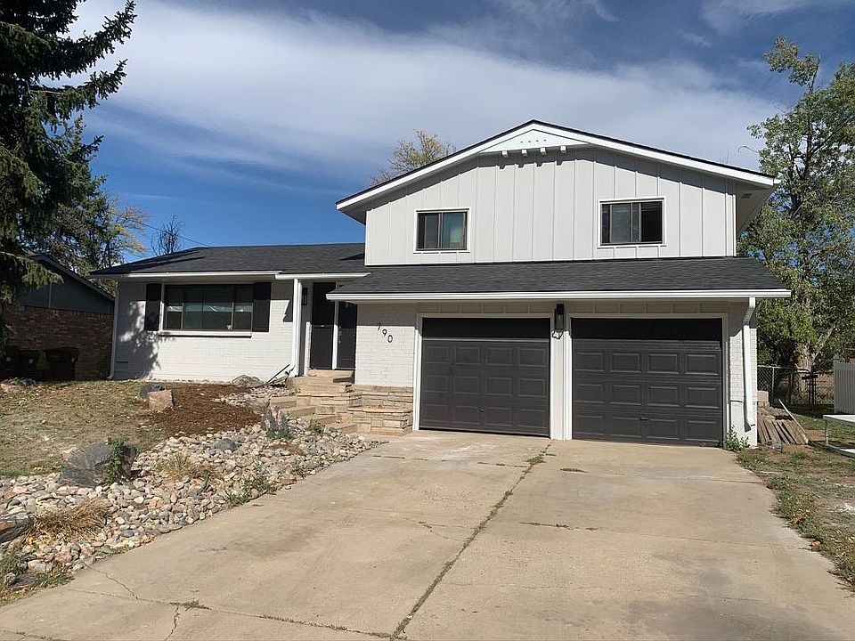 Exterior with new roof and paint.