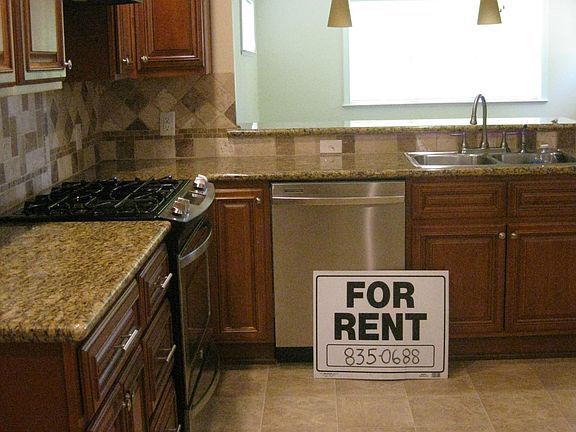 Kitchen looking into den