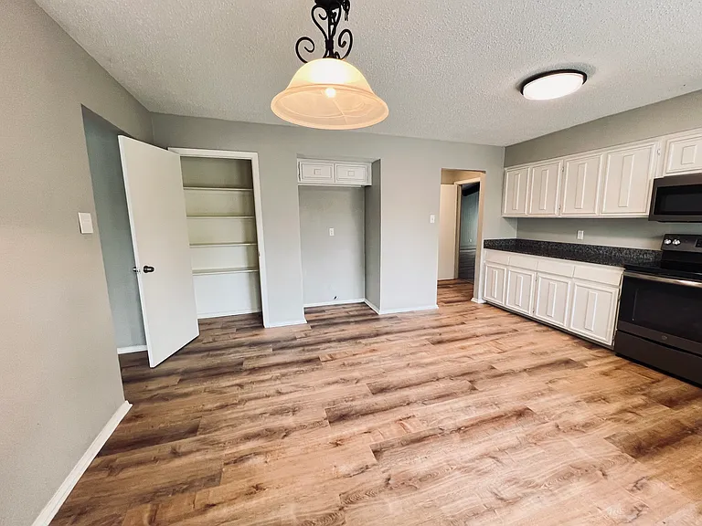 Good sized separate pantry closet, cabinets above the refrigerator alcove with a water line for filtered refrigerator water and ice maker. Refrigerator is not provided