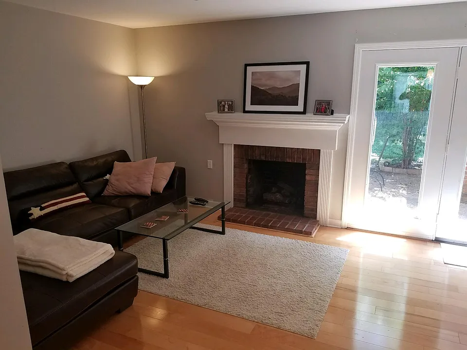 Living room with gas fireplace.