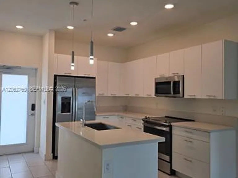 8167 NW 41st St E #409 — Photo 8