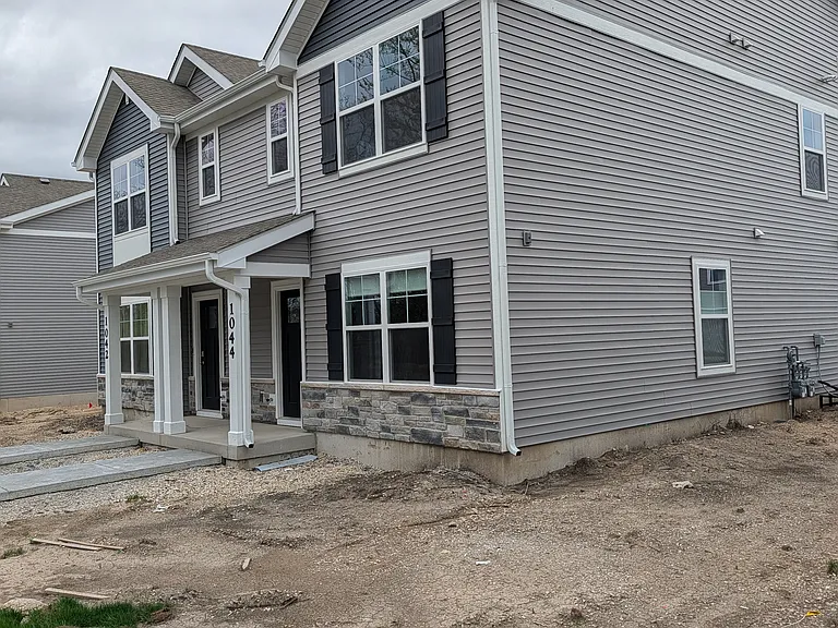 Twinhome. Front Exterior. 
Photo of a similar unit.
